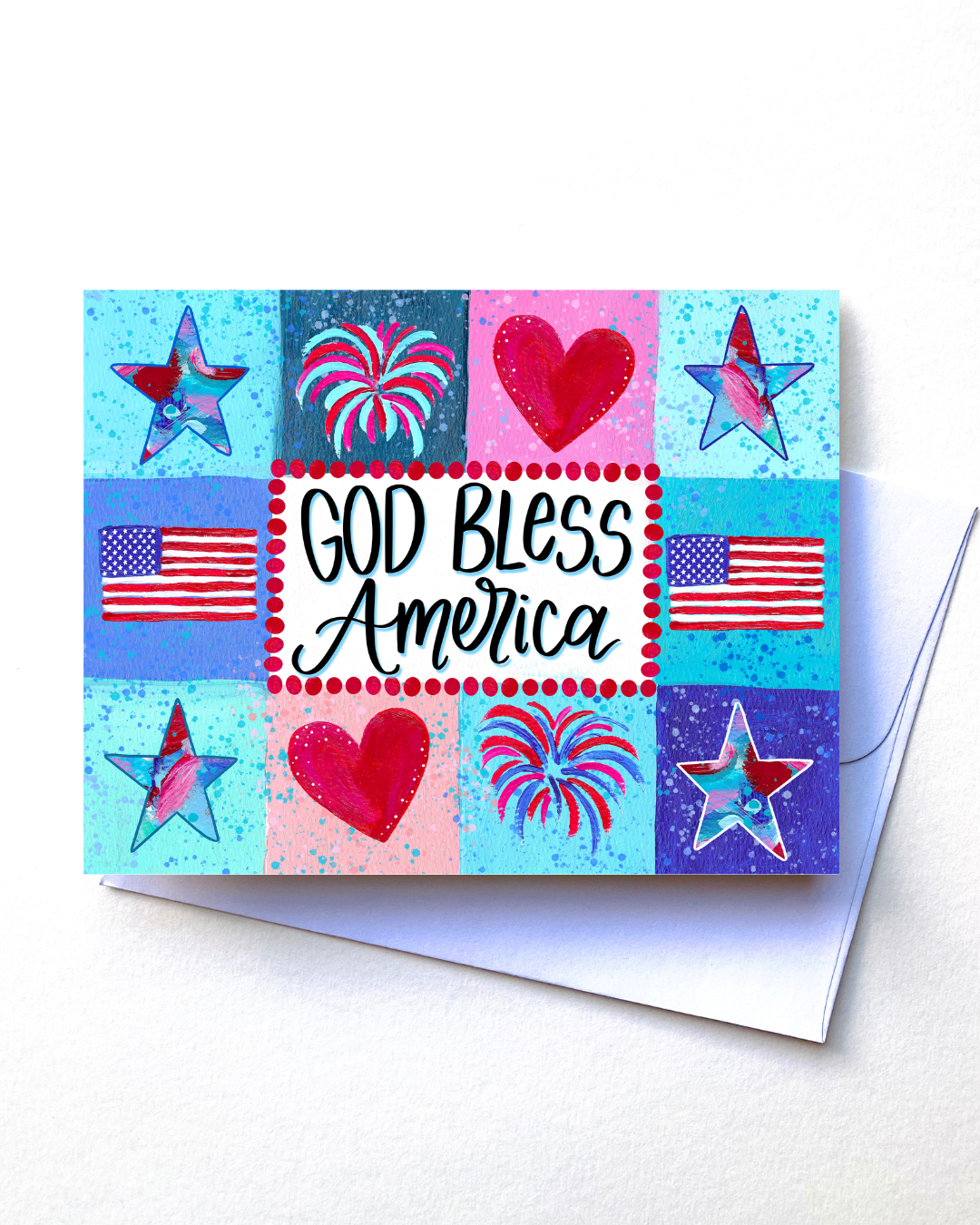 Greeting card with 'God Bless America' text, stars, hearts, and American flags on a colorful background.