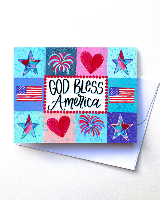 Greeting card with 'God Bless America' text, stars, hearts, and American flags on a colorful background.