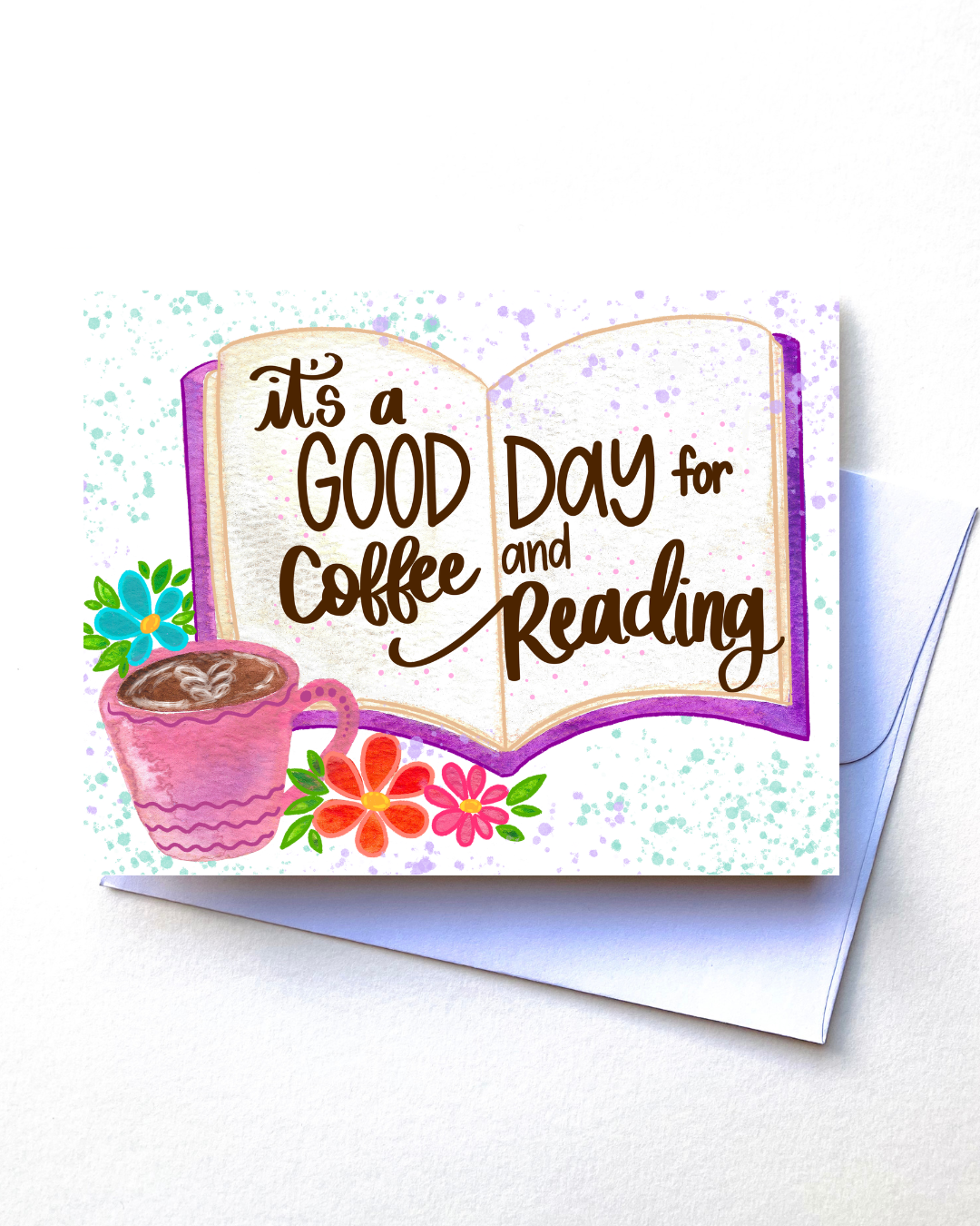 Greeting card with 'It's a good day for coffee and reading' text, flowers, and a cup on a white background