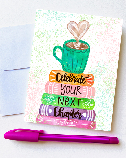 Greeting card with colorful design and text, accompanied by a pen on a white background